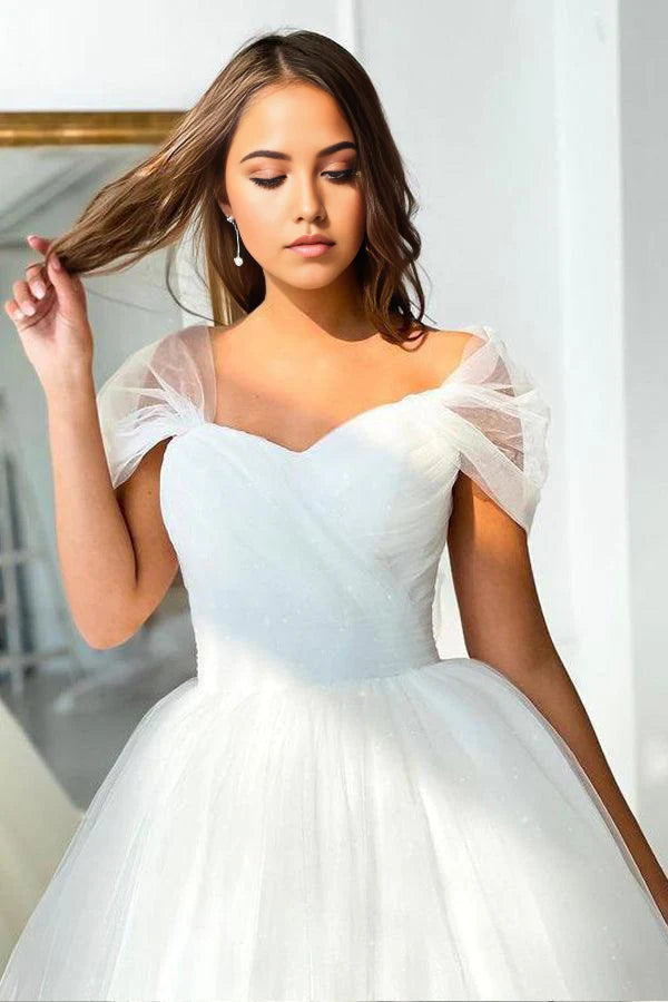 Vestido de novia de tul con corte A y hombros descubiertos